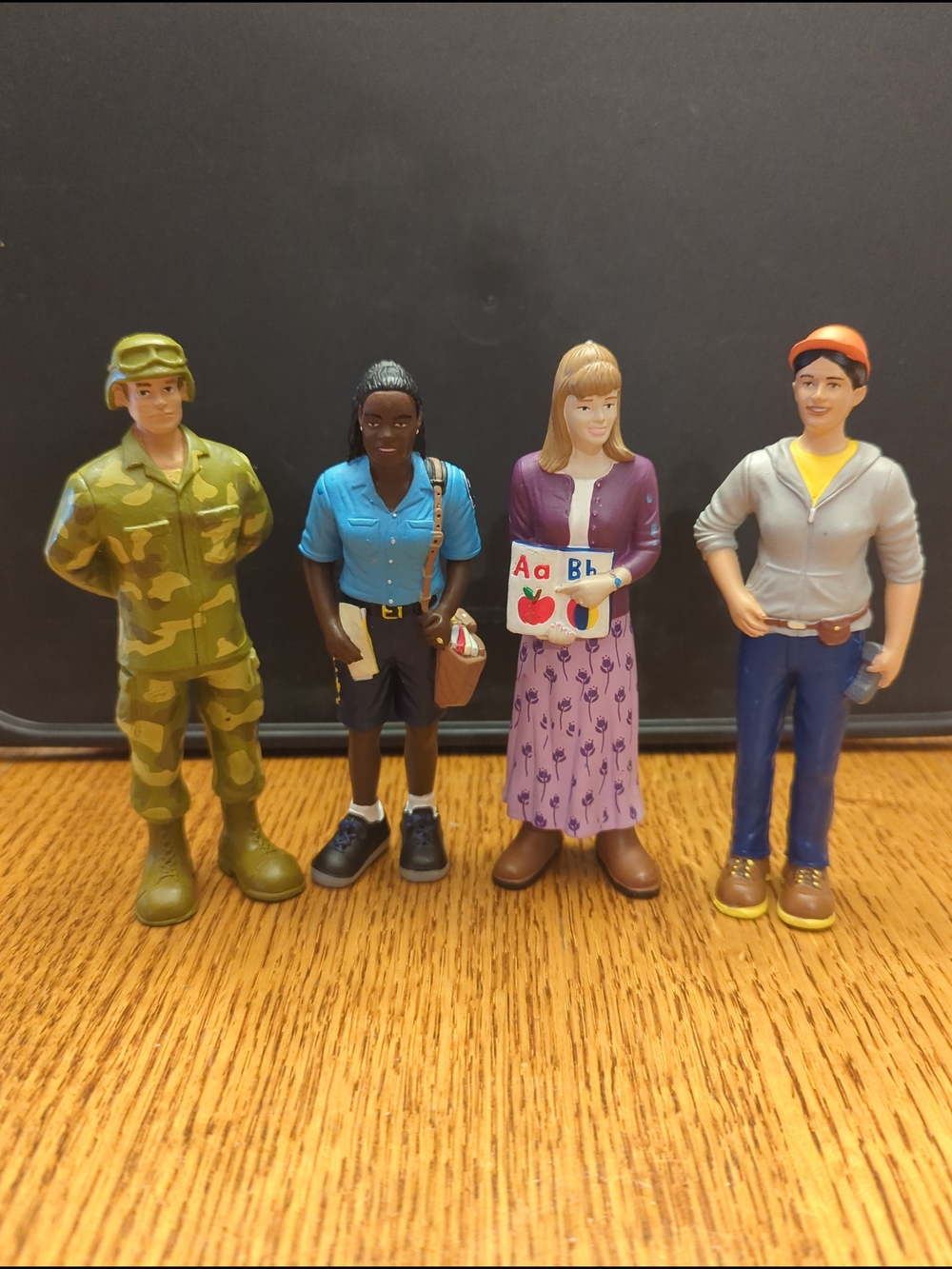 4 Lakeshore Learning Career Figures - Soldier, Postal, Teacher, & Construction